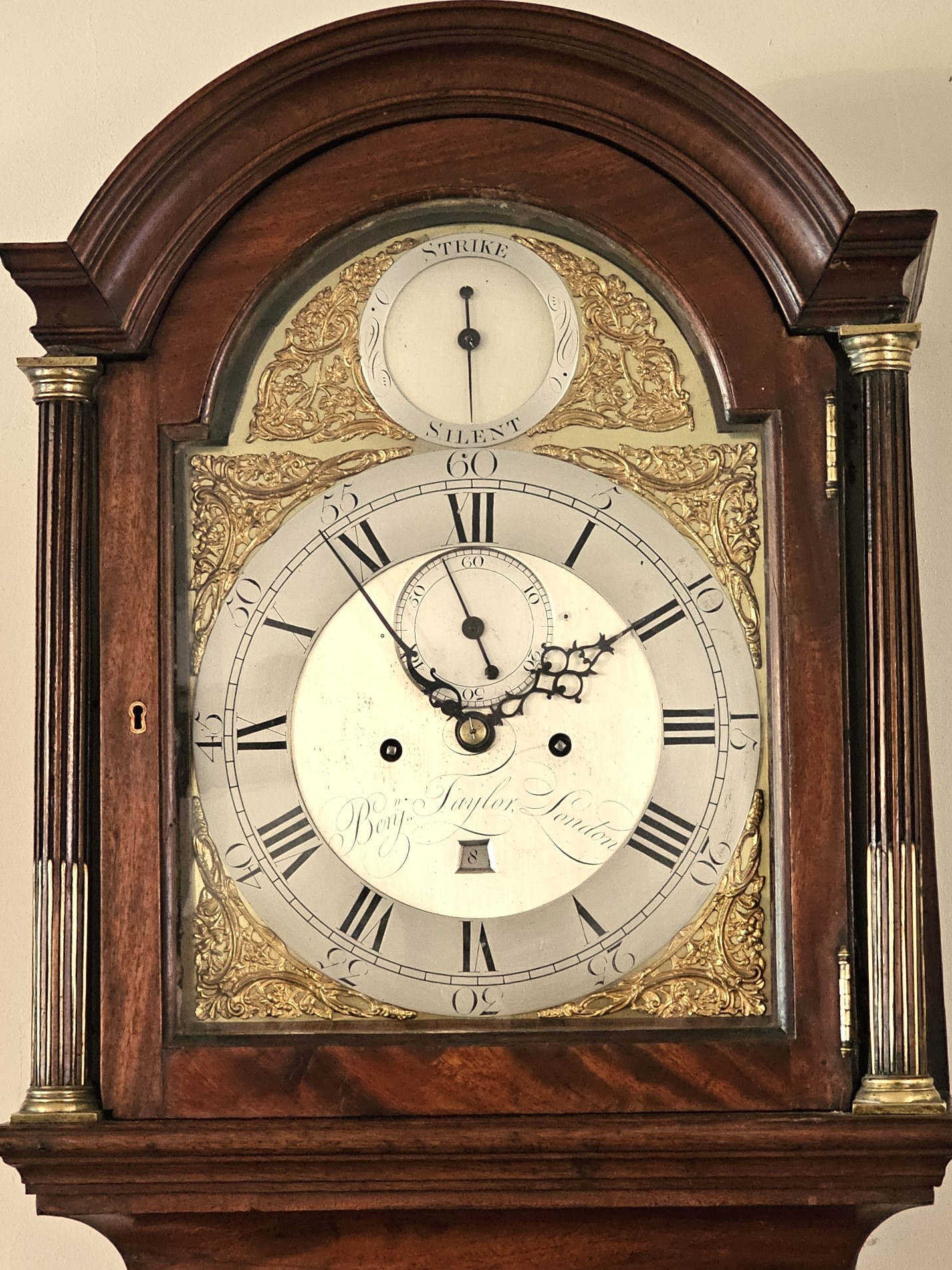 george-iii-mahogany-longcase-clock-by-benjamin-taylor Hood detail